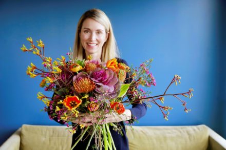 Liz of FiftyFlowers holding a bouquet
